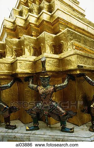 Thailand, Bangkok, Wat Phra Kaew, Statues at temple. View Large Photo Image Stock Photograph - Thailand, Bangkok, Wat Phra Kaew, Statues at temple.. Fotosearch