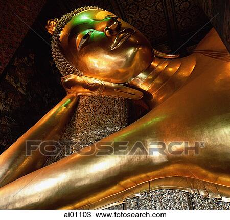 Stock Image - Thailand, Bangkok, Wat Po, reclining Buddha statue. Fotosearch