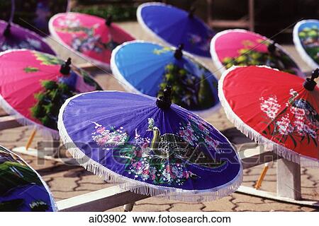 Thailand, Hand painted umbrellas drying in the sun. View Large Photo Image Stock Image - Thailand, Hand painted umbrellas drying in the sun.. Fotosearch