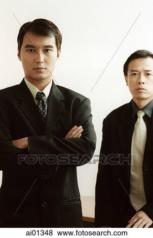 Two male executives, portrait, white background. View Large Photo Image Stock Photo - Two male executives, portrait, white background.. Fotosearch