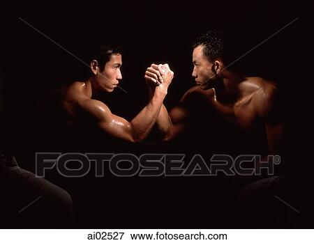Two men arm wrestling, black background View Large Photo Image Stock Photo - Two men arm wrestling, black background. Fotosearch
