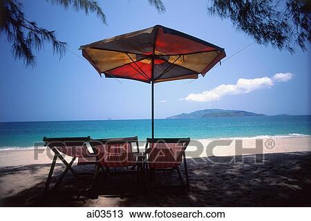 Vietnam, Beach chairs and umbrella on Nha Trang Beach View Large Photo Image Stock Image - Vietnam, Beach chairs and umbrella on Nha Trang Beach. Fotosearch