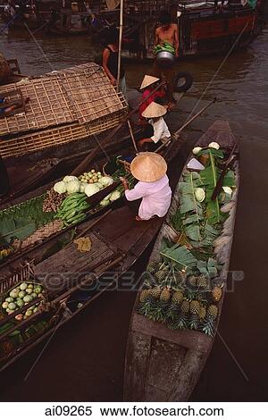 Vietnam, Can Tho, Hau river, Fruit and vegetable sellers, floating market. View Large Photo Image Stock Photography - Vietnam, Can Tho, Hau river, Fruit and vegetable sellers, floating market.. Fotosearch