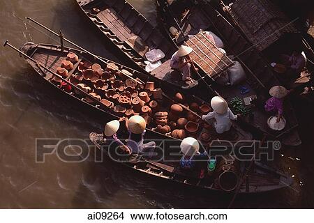 Picture - Vietnam, Can Tho, Hau river, Earthenware seller and other boats, floating market.. Fotosearch