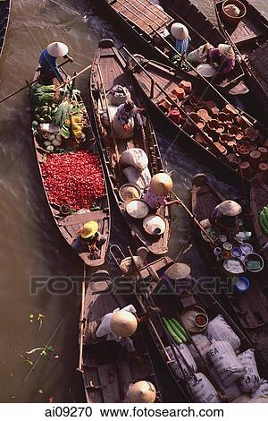 Stock Image - Vietnam, Can Tho, Hau river, Vegetables sellers, floating market.. Fotosearch