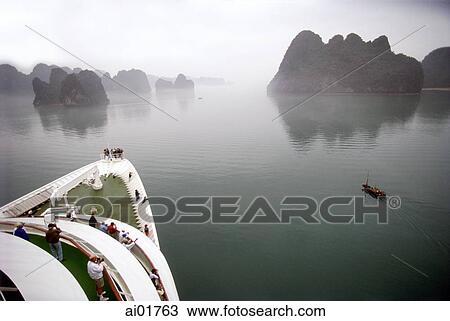 Vietnam, Halong Bay, cruise ship and small fishing boat. View Large Photo Image Stock Image - Vietnam, Halong Bay, cruise ship and small fishing boat.. Fotosearch