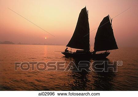 Vietnam, Halong Bay, Fishing junk at dawn View Large Photo Image Stock Photograph - Vietnam, Halong Bay, Fishing junk at dawn. Fotosearch
