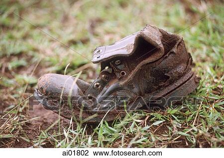 Vietnam, Hanoi, combat boot with bullet hole. View Large Photo Image Stock Image - Vietnam, Hanoi, combat boot with bullet hole.. Fotosearch