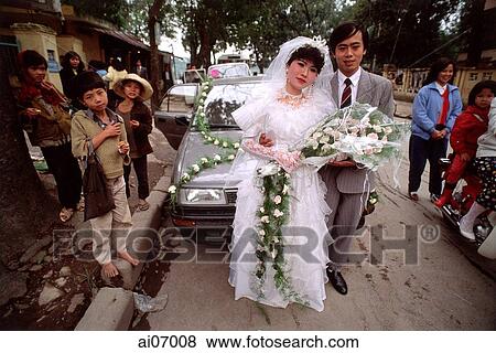 Vietnam, Hanoi, couple in wedding attire View Large Photo Image Stock Photo - Vietnam, Hanoi, couple in wedding attire. Fotosearch