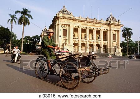Vietnam, Hanoi, Cyclo outside the Municipal Theatre View Large Photo Image Stock Photograph - Vietnam, Hanoi, Cyclo outside the Municipal Theatre. Fotosearch