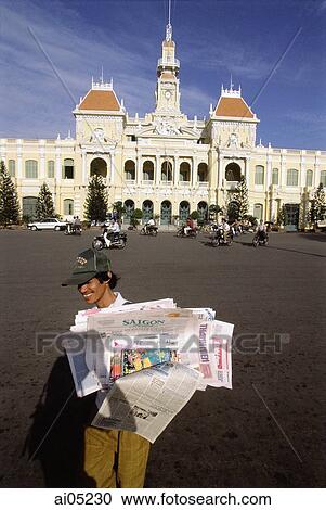 Vietnam, Ho Chi Minh City, A man selling newspapers on the street. View Large Photo Image Stock Image - Vietnam, Ho Chi Minh City, A man selling newspapers on the street.. Fotosearch