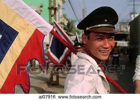 Vietnam, Ho Chi Minh City, Flag carrier at funeral procession. (grainy) View Large Photo Image Stock Photograph - Vietnam, Ho Chi Minh City, Flag carrier at funeral procession. (grainy). Fotosearch