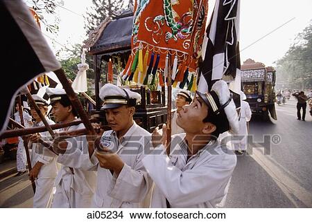 Vietnam, Ho Chi Minh City, formerly Saigon, Funeral procession winding its way through streets. View Large Photo Image Picture - Vietnam, Ho Chi Minh City, formerly Saigon, Funeral procession winding its way through streets.. Fotosearch