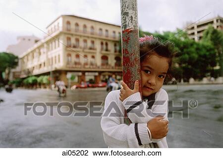 Vietnam, Ho Chi Minh City, girl at Lam Son Square. View Large Photo Image Stock Image - Vietnam, Ho Chi Minh City, girl at Lam Son Square.. Fotosearch