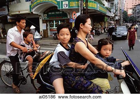 Vietnam, Ho Chi Minh City, Motorcycles and bicycles are used as an efficient means of transportation throughout Vietnam. View Large Photo Image Stock Photograph - Vietnam, Ho Chi Minh City, Motorcycles and bicycles are used as an efficient means of transportation throughout Vietnam.. Fotosearch