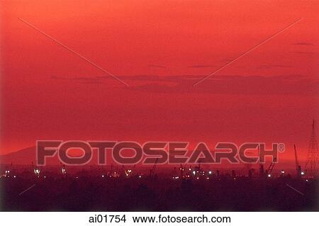Vietnam, Ho Chi Minh City (Saigon), sunset over port. View Large Photo Image Picture - Vietnam, Ho Chi Minh City (Saigon), sunset over port.. Fotosearch