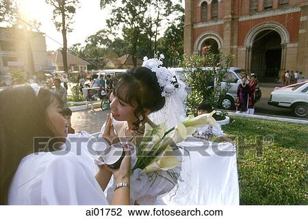 Vietnam, Ho Chi Minh City (Saigon), wedding in front of Notre Dame Cathedral. View Large Photo Image Stock Image - Vietnam, Ho Chi Minh City (Saigon), wedding in front of Notre Dame Cathedral.. Fotosearch
