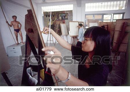 Vietnam, Ho Chi Minh City (Saigon), woman sketching portrait of man. View Large Photo Image Stock Photo - Vietnam, Ho Chi Minh City (Saigon), woman sketching portrait of man.. Fotosearch