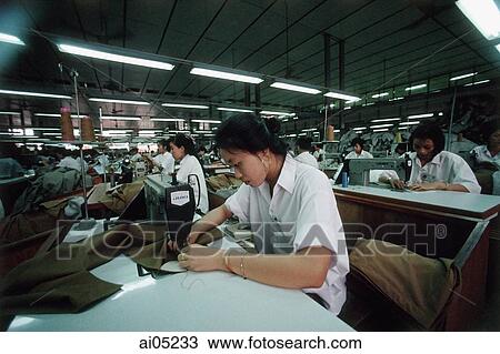 Vietnam, Ho Chi Minh City, Women sewing fabric in a factory. View Large Photo Image Stock Image - Vietnam, Ho Chi Minh City, Women sewing fabric in a factory.. Fotosearch