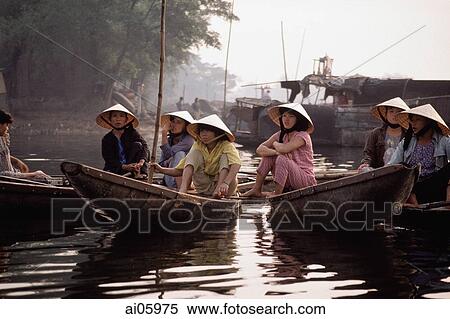 Vietnam, Hue, locals on boats at morning market View Large Photo Image Stock Photography - Vietnam, Hue, locals on boats at morning market. Fotosearch