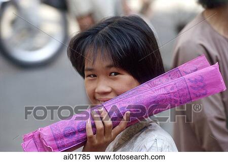 Vietnam, Lao Cai, young woman selling packs of incense sticks. View Large Photo Image Stock Photography - Vietnam, Lao Cai, young woman selling packs of incense sticks.. Fotosearch