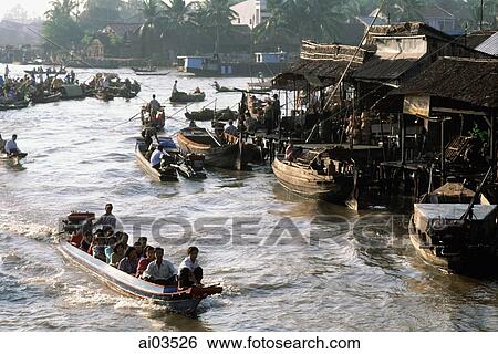Vietnam, Mekong Delta, boats at market View Large Photo Image Stock Photograph - Vietnam, Mekong Delta, boats at market. Fotosearch