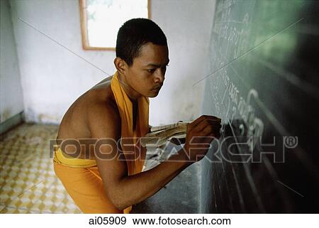 Vietnam, Mekong Delta region, Bac Lieu, Buddhist monk of Khmer origin writing on blackboard. View Large Photo Image Stock Photo - Vietnam, Mekong Delta region, Bac Lieu, Buddhist monk of Khmer origin writing on blackboard.. Fotosearch