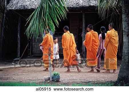 Vietnam, Mekong Delta region, Bac Lieu, Buddhist monks walking on street in search of alms. View Large Photo Image Stock Photography - Vietnam, Mekong Delta region, Bac Lieu, Buddhist monks walking on street in search of alms.. Fotosearch