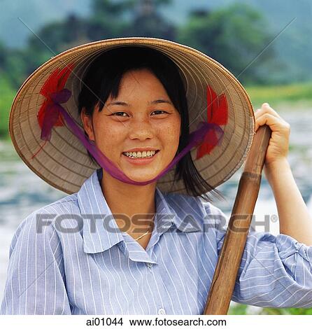 Vietnam, near Hanoi, Vietnamese woman in boat View Large Photo Image Picture - Vietnam, near Hanoi, Vietnamese woman in boat. Fotosearch