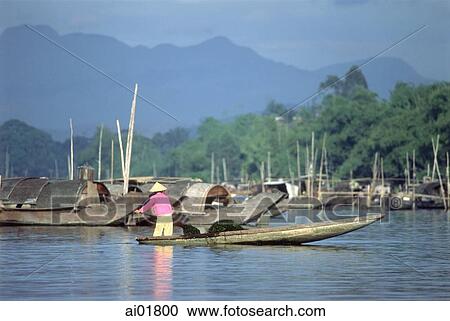 Vietnam, near Hue, fishing boats on Perfume River. View Large Photo Image Stock Image - Vietnam, near Hue, fishing boats on Perfume River.. Fotosearch