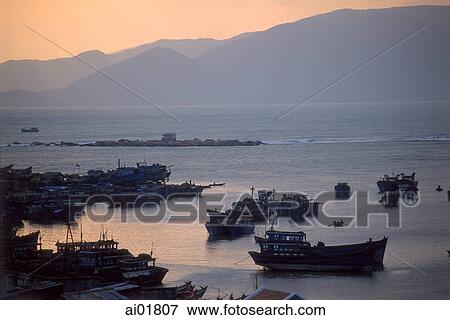 Vietnam, Nha Trang, boats at port on South China Sea. View Large Photo Image Stock Photo - Vietnam, Nha Trang, boats at port on South China Sea.. Fotosearch