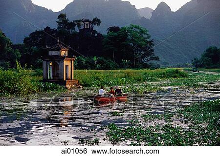Vietnam, Perfume Pagoda, Hanoi, Villagers in a small boat View Large Photo Image Stock Photograph - Vietnam, Perfume Pagoda, Hanoi, Villagers in a small boat. Fotosearch