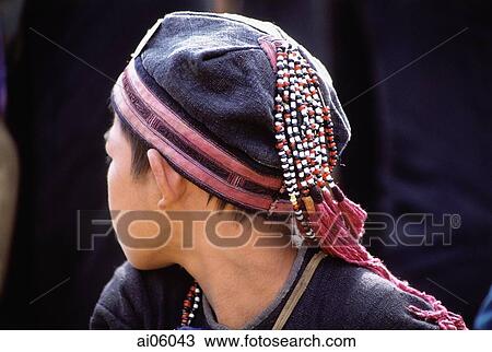 Vietnam, Sa Pa, Close-up of Hmong boy wearing traditional cap View Large Photo Image Stock Image - Vietnam, Sa Pa, Close-up of Hmong boy wearing traditional cap. Fotosearch