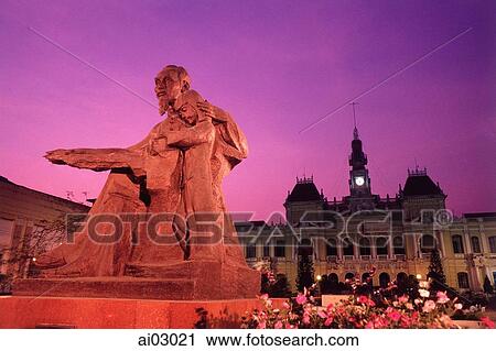 Vietnam, Saigon, Statue of Ho Chi-Minh with Hotel De Ville in background at dusk View Large Photo Image Stock Image - Vietnam, Saigon, Statue of Ho Chi-Minh with Hotel De Ville in background at dusk. Fotosearch