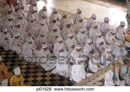 Vietnam, Tay Ninh, believers with white headbands in Cao Dai Great Temple. View Large Photo Image Stock Photo - Vietnam, Tay Ninh, believers with white headbands in Cao Dai Great Temple.. Fotosearch