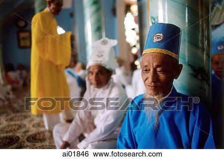 Vietnam, Tay Ninh, Cao Dai lay priests in Cao Dai Great Temple. View Large Photo Image Stock Photograph - Vietnam, Tay Ninh, Cao Dai lay priests in Cao Dai Great Temple.. Fotosearch