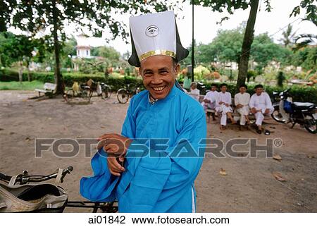 Vietnam, Tay Ninh, Cao Dai priest in blue robe. View Large Photo Image Stock Image - Vietnam, Tay Ninh, Cao Dai priest in blue robe.. Fotosearch