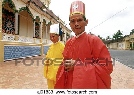 Vietnam, Tay Ninh, Cao Dai priests outside of Cao Dai Great Temple. View Large Photo Image Stock Image - Vietnam, Tay Ninh, Cao Dai priests outside of Cao Dai Great Temple.. Fotosearch