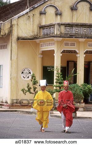 Vietnam, Tay Ninh, Cao Dai priests outside Cao Dai Great Temple. View Large Photo Image Stock Photo - Vietnam, Tay Ninh, Cao Dai priests outside Cao Dai Great Temple.. Fotosearch