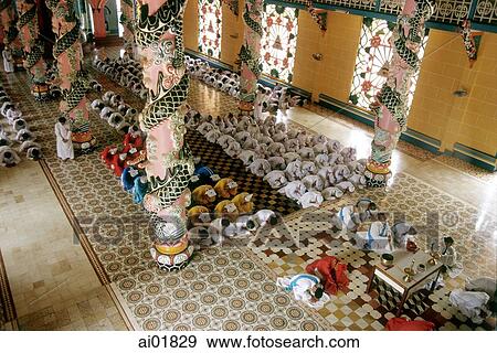 Vietnam, Tay Ninh, inside of the Cao Dai Great Temple and its worshippers. View Large Photo Image Stock Photo - Vietnam, Tay Ninh, inside of the Cao Dai Great Temple and its worshippers.. Fotosearch