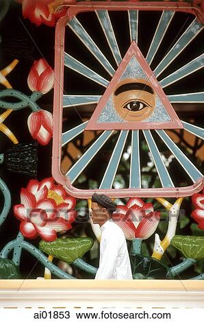 Vietnam, Tay Ninh, "One Eye of God" supreme symbol of Cao Dai faith. View Large Photo Image Stock Image - Vietnam, Tay Ninh, "One Eye of God" supreme symbol of Cao Dai faith.. Fotosearch