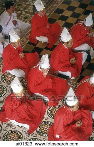 Vietnam, Tay Ninh, priests in red garments in Cao Dai Great Temple. View Large Photo Image Stock Image - Vietnam, Tay Ninh, priests in red garments in Cao Dai Great Temple.. Fotosearch