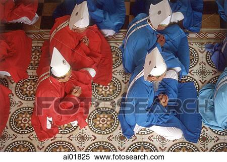 Vietnam, Tay Ninh, priests with red and blue robe in Cao Dai Great Temple. View Large Photo Image Stock Photography - Vietnam, Tay Ninh, priests with red and blue robe in Cao Dai Great Temple.. Fotosearch