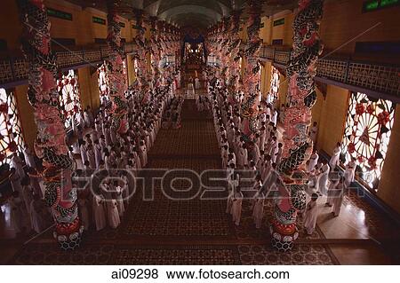 Vietnam, Tay Ninh, Worshippers inside Holy See Temple. View Large Photo Image Stock Photo - Vietnam, Tay Ninh, Worshippers inside Holy See Temple.. Fotosearch