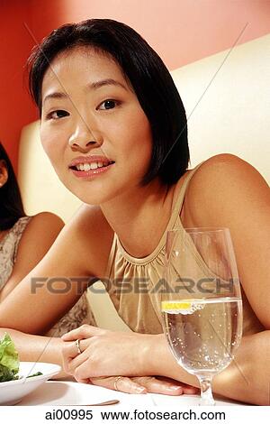 Woman at restaurant, portrait View Large Photo Image Stock Photography - Woman at restaurant, portrait. Fotosearch