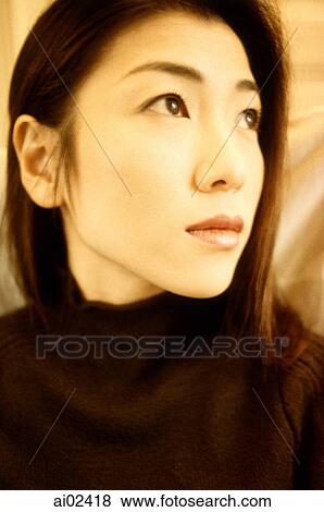 Woman in black turtleneck looking off camera. View Large Photo Image Stock Photo - Woman in black turtleneck looking off camera.. Fotosearch