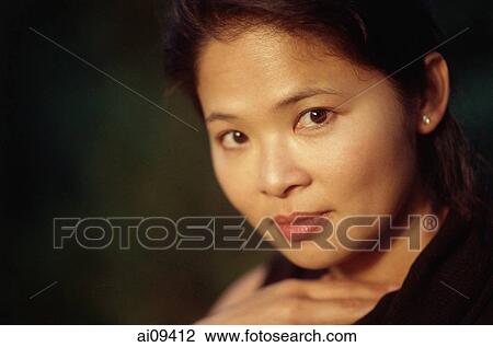 Woman looking at camera View Large Photo Image Stock Image - Woman looking at camera. Fotosearch