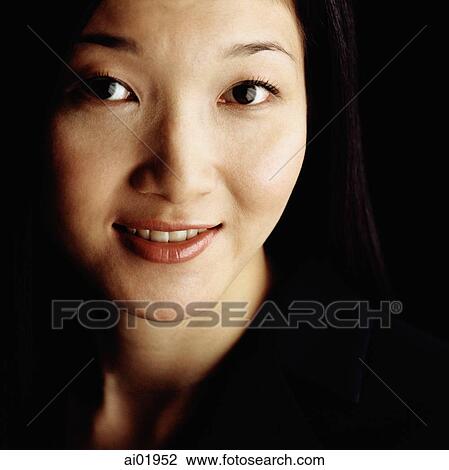 Woman, portrait, black background View Large Photo Image Stock Image - Woman, portrait, black background. Fotosearch
