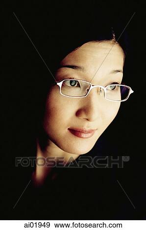 Woman, portrait, black background View Large Photo Image Stock Photo - Woman, portrait, black background. Fotosearch