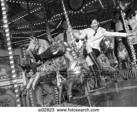 Woman riding horse on carousel. View Large Photo Image Stock Image - Woman riding horse on carousel.. Fotosearch